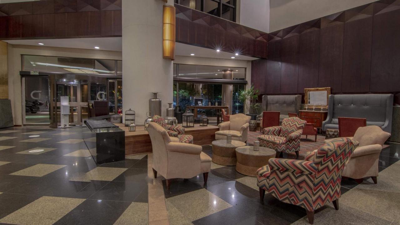 Hotel Deville Prime Porto Alegre Eksteriør bilde Lobby